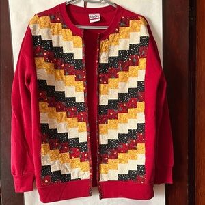 Red sweatshirt that has been customized with a quilted patchwork, large